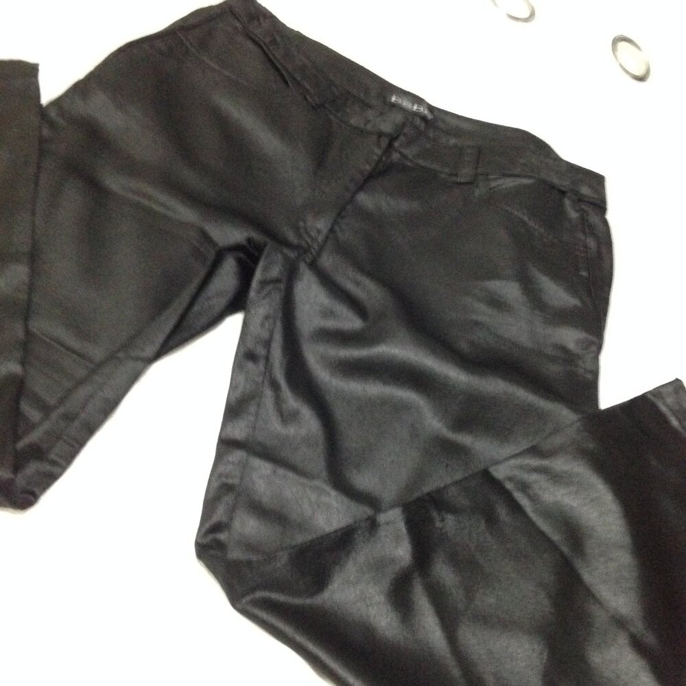 Like new bebe has stretch shiny pants, Size 6